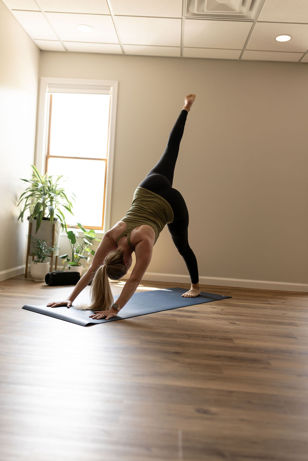 Yoga flow leg poses at Brookfield, WI yoga studio