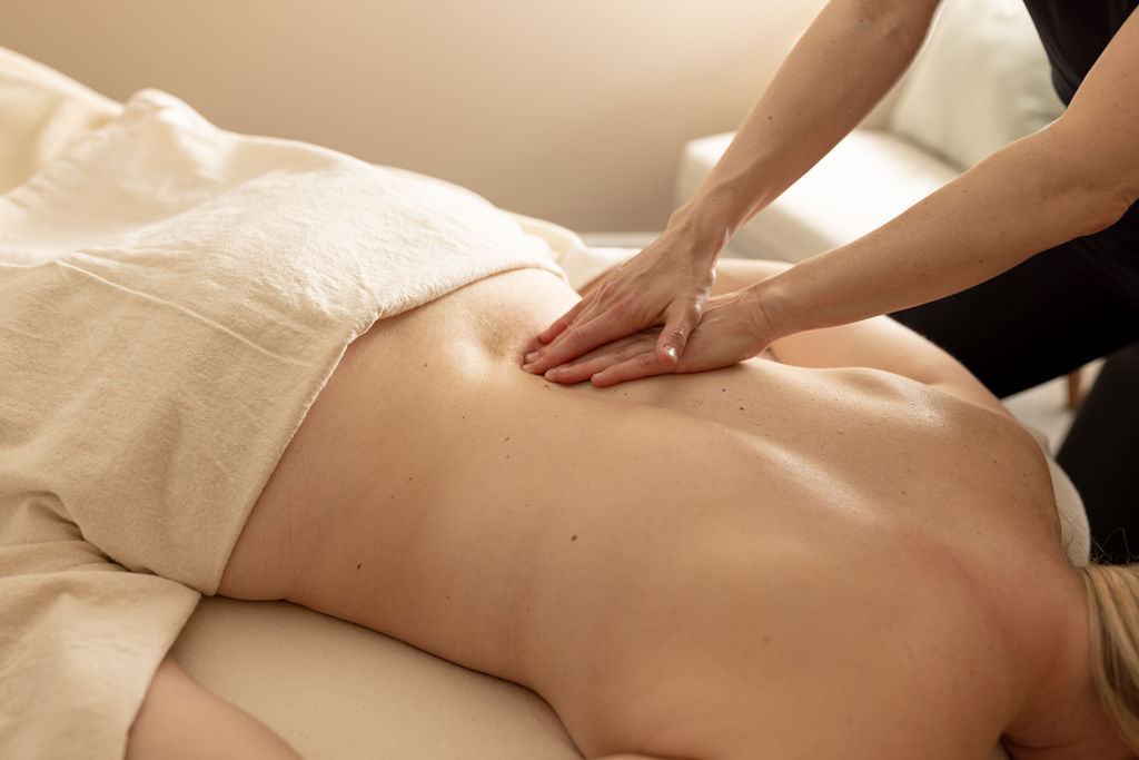 Deep tissue massage at MEND Studios